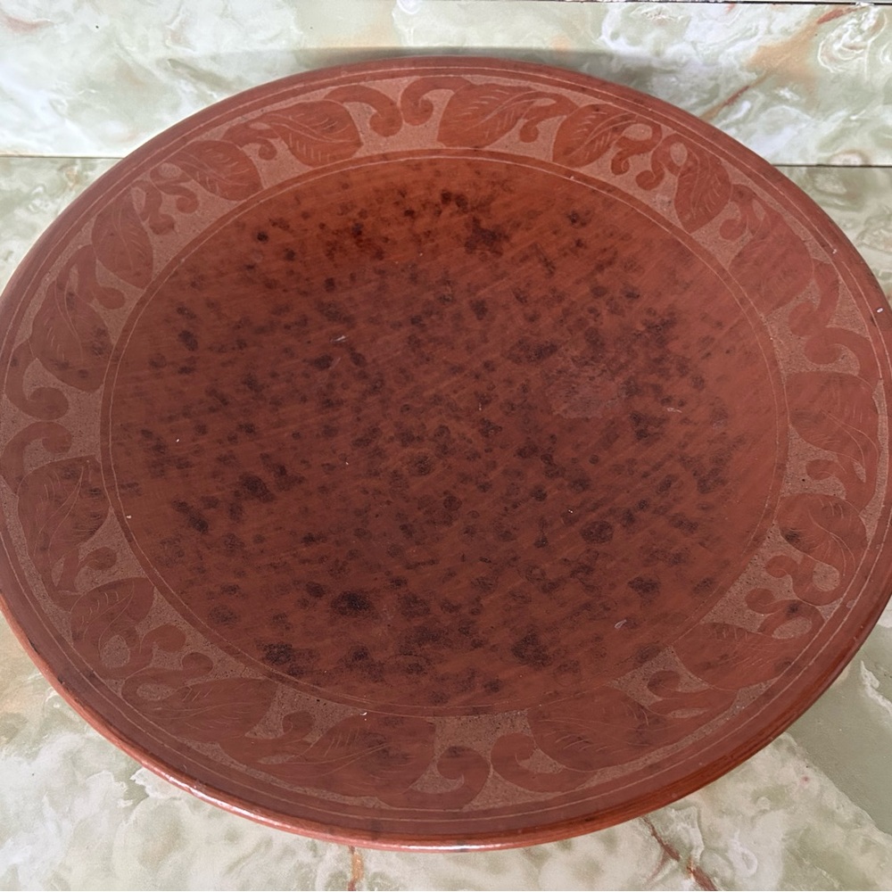 Decorative terracotta clay bowl.